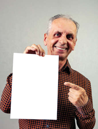 self-satisfied retiree happy smiling, copy-space to insert your imageの写真素材