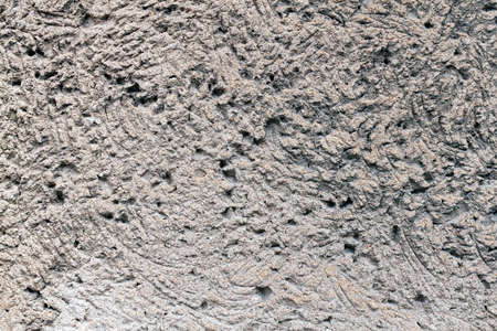 gray plastered surface background close upの写真素材
