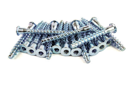 a bunch of screws on a white background with space for text