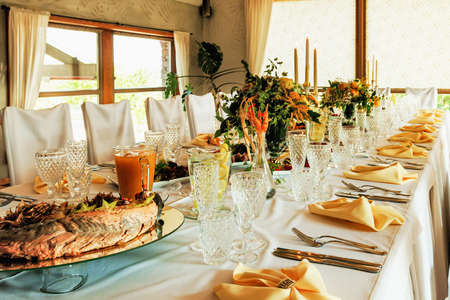 a festive dinner for a wedding with a decorated table