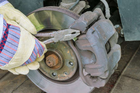 Car brake caliper disassembly repair in the garage