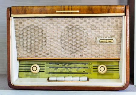 Panevezys, Lithuania - June 2021 14d. Antique lamp with radio with two speakers, wooden frameのeditorial素材