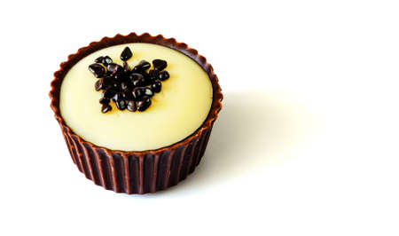 Chocolate candy with marzipan filling, isolated on a white background with space for text