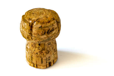 The champagne stopper is isolated on a white background up close with space for textの写真素材