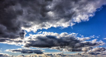 Autumn background of dark rain clouds in the sky