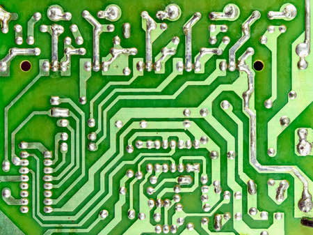 Printed green electronic board with connection tracks computer hardware technology.