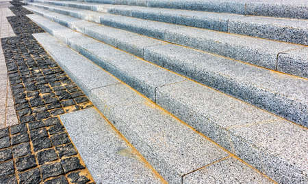 the stairs of the city with the sidewalk in the distance and in the daylight