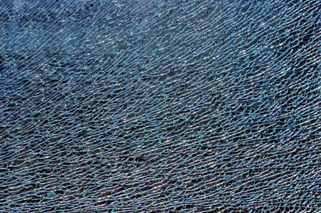 protective outdoor wall broken tempered glass texture background close up