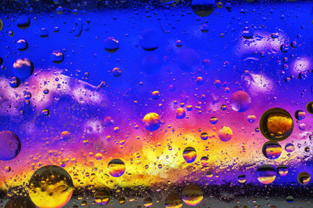 abstract colorful background of oil with many bubbles on water surface