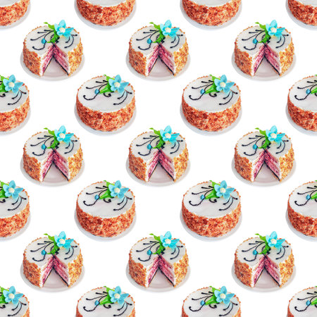 Festive round dessert with decoration on white background isolated as a seamless patternの写真素材
