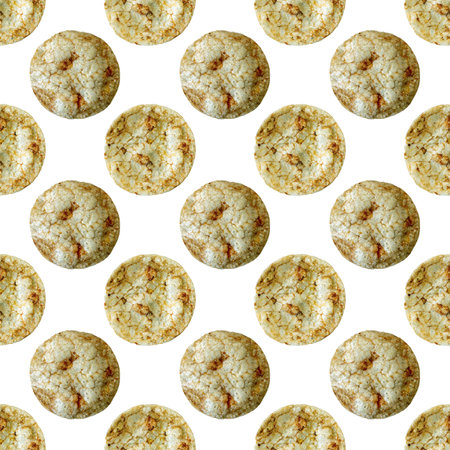 Brown rice chips with spices and salt isolated on white background as a seamless patternの写真素材