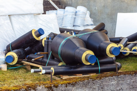 Various water pipes with thermal insulation isotherm and other materials on the construction site close upの写真素材