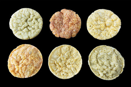 Assortment of healthy vegan chickpea chips with vegetables isolated on black background