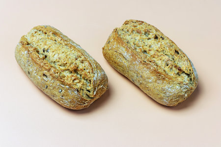 Top view of two small fitness buns on orange background