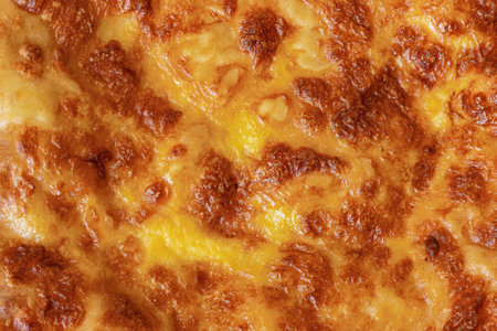 Georgian khachapuri freshly baked close-up view as background with nice crustの写真素材