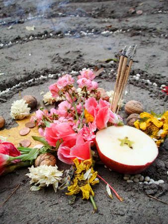 Magic spiral works next to a lake, wicca altar.の写真素材