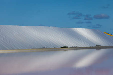 Salt flats in Bonaire (netherlands antilles). Salt pyramids and highly salinated red water.の写真素材