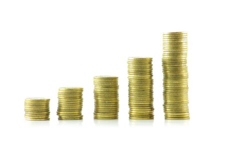 polish coins arranged in columns,  towers, white backgroundの写真素材