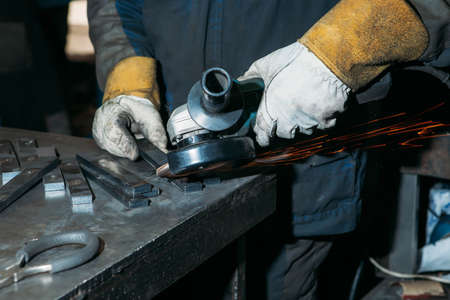 sparks from metal polishing by the grinderの写真素材