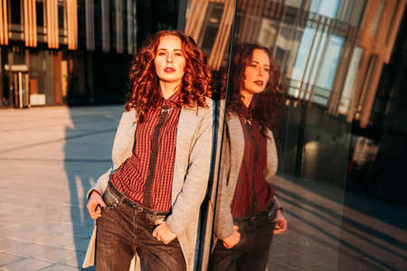 Business woman standing outside the office