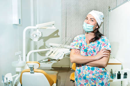 Portrait of a beautiful young woman doctor, dentistの写真素材