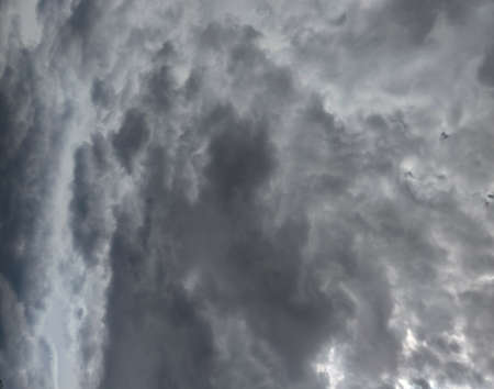 Beautiful dark clouds on the sky. Black-white-gray