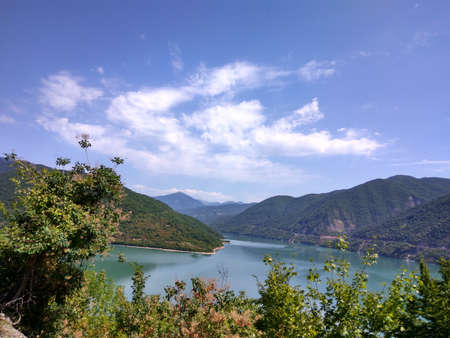 beautiful lake in the mountains. Georgia.Lake Jinvali. Summer