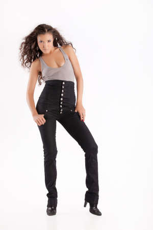 Young beautiful woman on a studio backgroundの写真素材