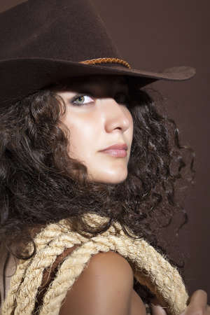 Young woman in western styleの写真素材