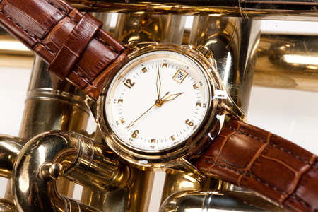 Wristwatch with leather belt on isolated backgroundの写真素材