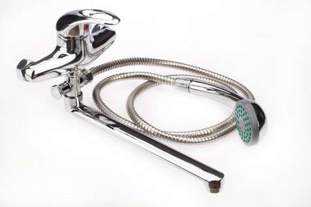Metal chromium-plated water mixer on an isolated backgroundの写真素材