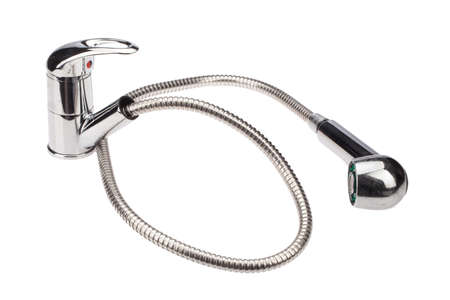 Metal chromium-plated water mixer on an isolated backgroundの写真素材