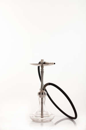 Traditional eastern hookah on an isolated studio backgroundの写真素材