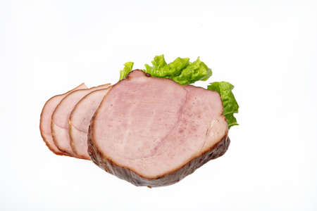Smoked beef and greenery on an isolated studio backgroundの写真素材