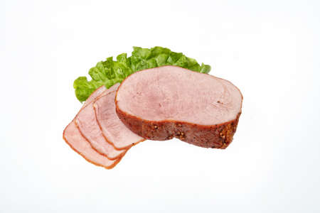 Smoked beef and greenery on an isolated studio backgroundの写真素材