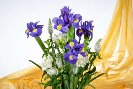 Bouquet of flowers on a fabric backgroundの写真素材