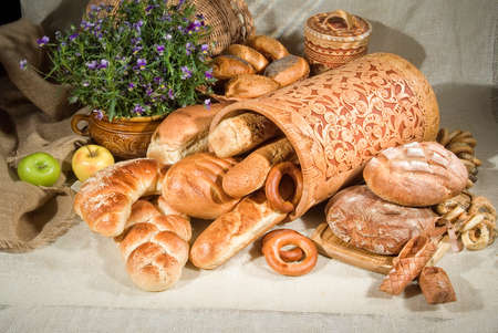 Different kinds of bread on a studio backgroundの写真素材