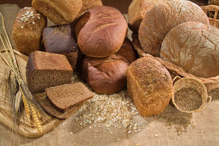 Different kinds of bread on a studio background