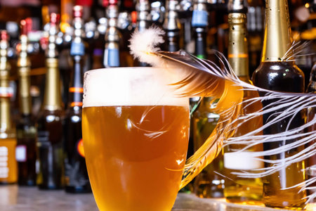 Glass of beer with foam, bubbles and dropsの素材