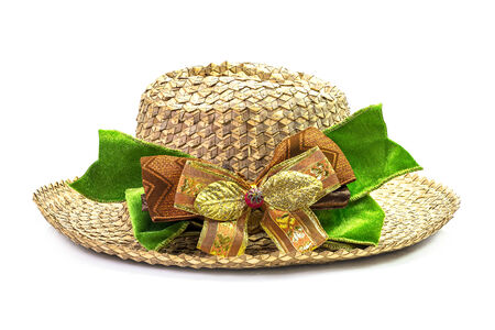 Basketwork hat with bow isolated on whiteの写真素材