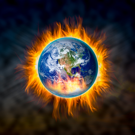 Globe catching fire in doomsday concept, Elements of this image furnished by NASAの写真素材