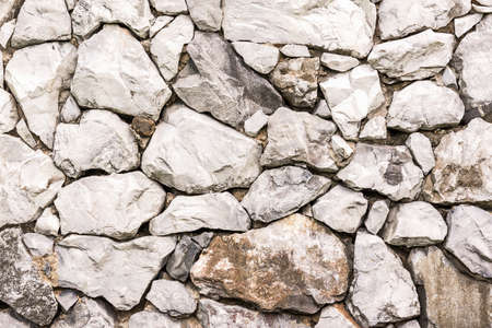Grunge stone wall for background and texture materialの写真素材
