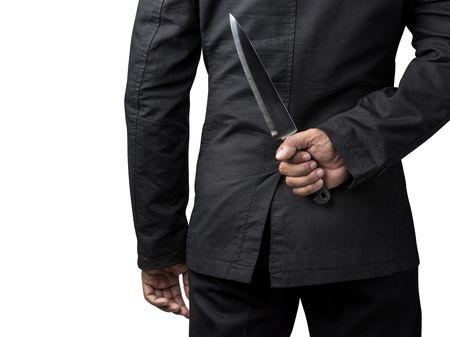 businessman hold on knife in concept of business betray isolated on white