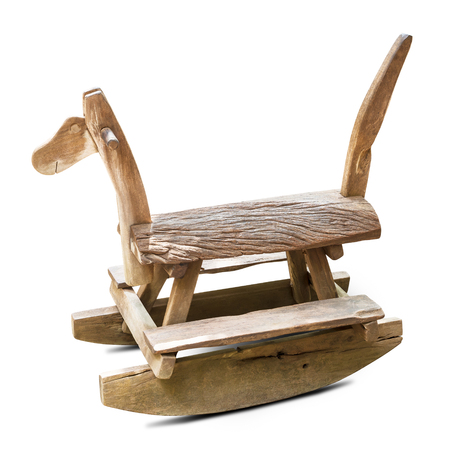 Wooden horse rocking bench isolated on whiteの写真素材