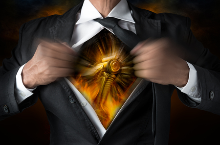 Metal machinery inside the businessman body in concept of hardworkingの写真素材