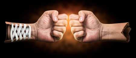 Creative of boxing hand on dark background with clipping pathの写真素材