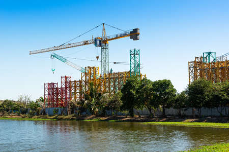 Crane for construction site equipment on blue sky backgroundの写真素材
