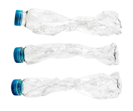 Recycled plastic bottles twisted shape, isolated on white background with clipping pathの写真素材