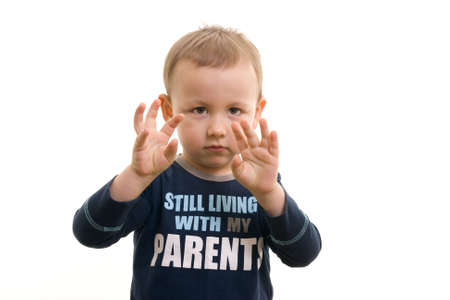 boy showing handsの写真素材