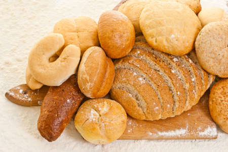  bread on the baking board sprinkled with flour